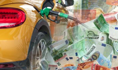 Pompe di benzina in una stazione di servizio con banconote in euro. Aumento dei prezzi.